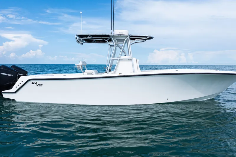 Yacht Photos Pics 2018 SeaVee 29 boat on calm ocean waters under a clear blue sky.