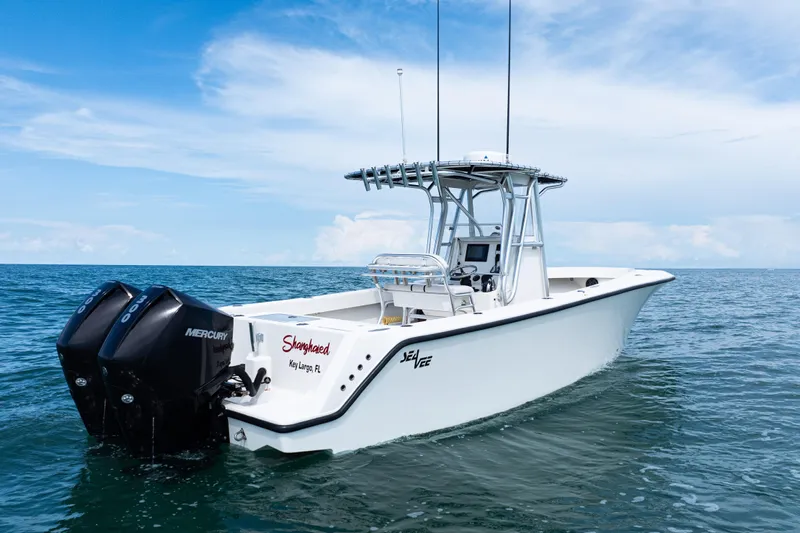  Yacht Photos Pics 2018 SeaVee 29 boat with dual Mercury engines on open water.