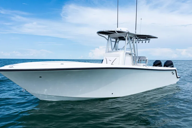  Yacht Photos Pics 2018 SeaVee 29 boat on calm ocean waters under a clear blue sky.