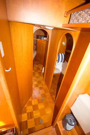 Seascape Yacht Photos Pics 1989 Cheoy Lee 53 yacht interior with wooden paneling and cozy cabin spaces.