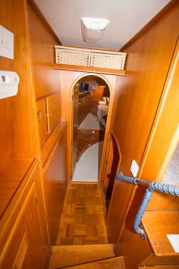 Seascape Yacht Photos Pics Interior hallway of 1989 Cheoy Lee 53 yacht with wooden finishes.