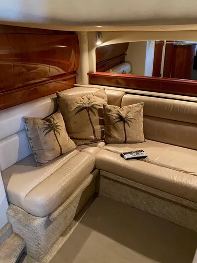  Yacht Photos Pics 2006 Sea Ray 44 Sundancer interior with beige leather seating and palm tree pillows.