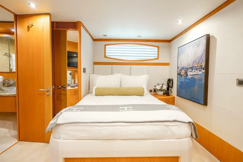 Serenity Yacht Photos Pics Luxurious 2008 Lazzara Motor Yacht bedroom with elegant decor and modern amenities.