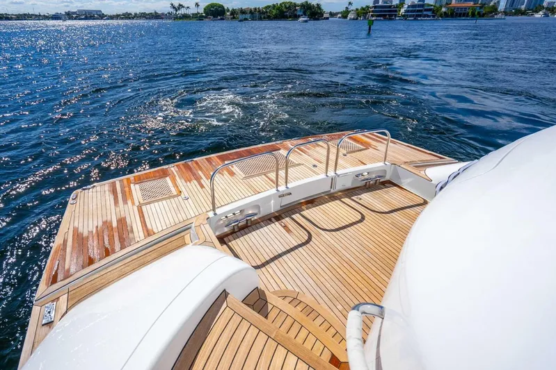 Serenity Yacht Photos Pics Luxurious 2008 Lazzara Motor Yacht with elegant wooden deck on serene water.