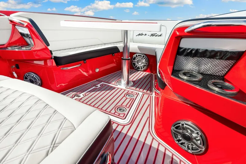  Yacht Photos Pics Luxurious 2022 Nor-Tech 390 SS boat interior with red and white seating and modern amenities.