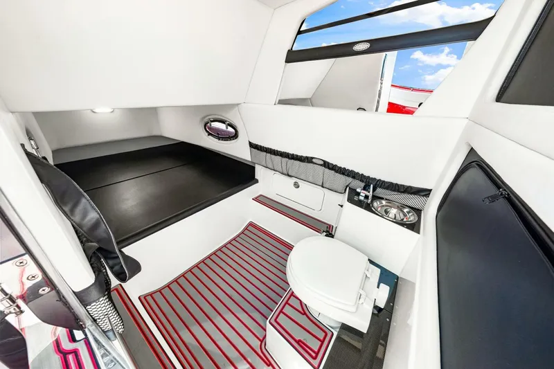  Yacht Photos Pics 2022 Nor-Tech 390 SS cabin interior with modern amenities and sleek design.