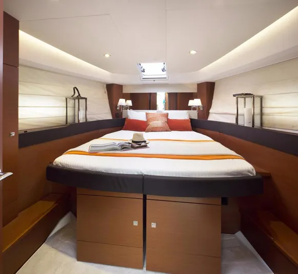Bee's Knees Yacht Photos Pics Manufacturer Provided Image: Luxurious bedroom interior of 2017 Jeanneau NC 14 yacht with modern design.