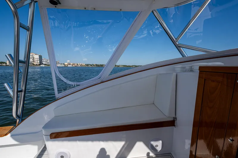 Dreams Afloat Yacht Photos Pics 2019 Custom Carolina Custom Express boat interior with ocean view and clear blue sky.