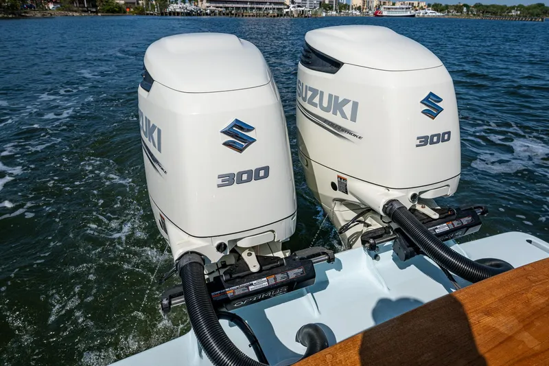 Dreams Afloat Yacht Photos Pics Twin Suzuki 300 outboard engines on a 2019 Custom Carolina Custom Express boat.