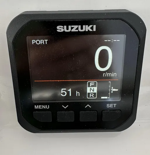 Dreams Afloat Yacht Photos Pics Suzuki digital display showing 0 RPM and 51 hours on a Custom Carolina Express 2019.
