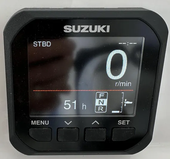 Dreams Afloat Yacht Photos Pics Suzuki digital display showing 0 RPM and 51 hours on a Custom Carolina boat.