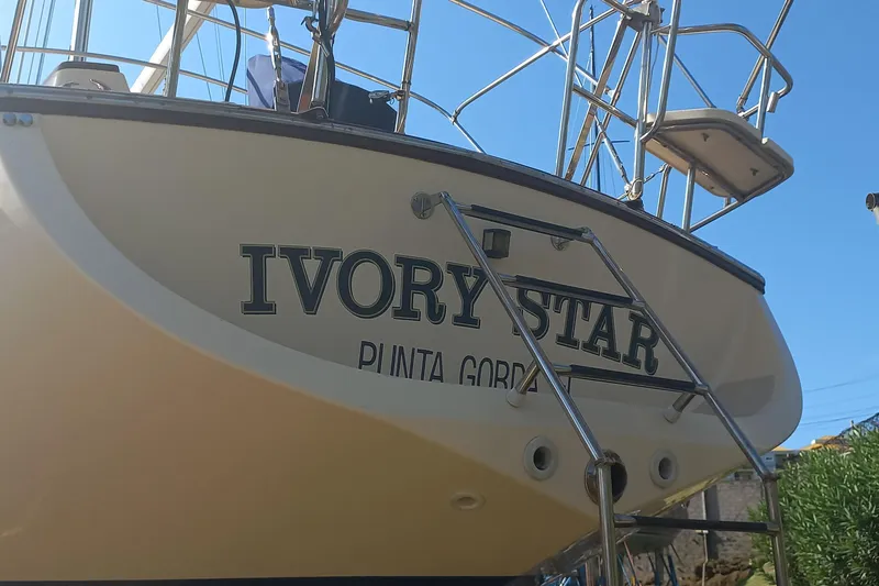 Ivory Star Yacht Photos Pics Island Packet 350 sailboat "Ivory Star" with ladder, Punta Gorda, 1999 model.