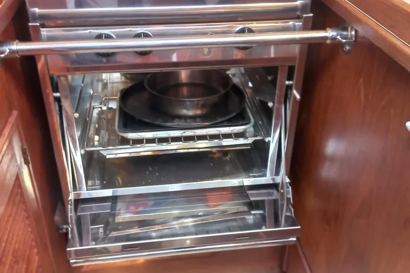Ivory Star Yacht Photos Pics Stainless steel oven in 1999 Island Packet 350 yacht kitchen.