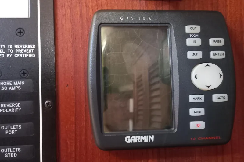 Ivory Star Yacht Photos Pics Garmin GPS device on 1999 Island Packet 350 sailboat control panel.