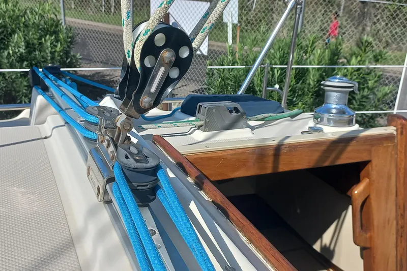 Ivory Star Yacht Photos Pics Close-up of 1999 Island Packet 350 sailboat deck with ropes and winch.