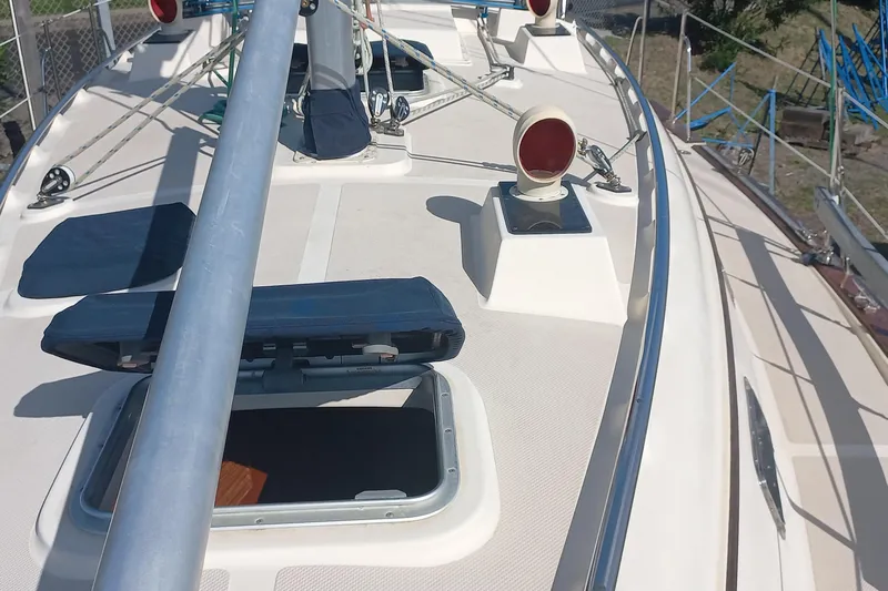 Ivory Star Yacht Photos Pics Deck view of a 1999 Island Packet 350 sailboat with open hatch and rigging.