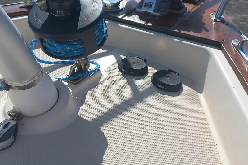 Ivory Star Yacht Photos Pics Deck of 1999 Island Packet 350 sailboat with winch and cleats.