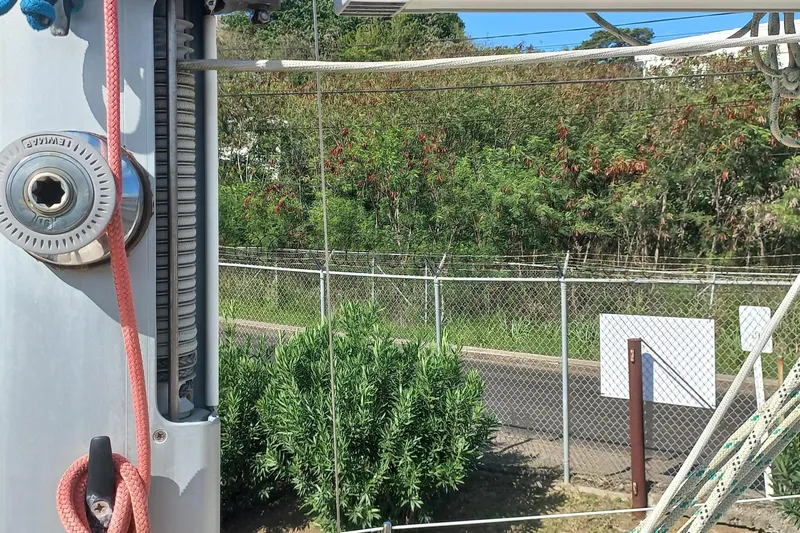 Ivory Star Yacht Photos Pics Close-up of a 1999 Island Packet 350 sailboat mast with ropes and winch.
