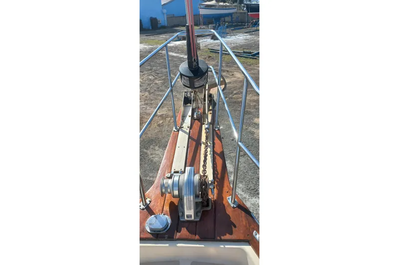 Ivory Star Yacht Photos Pics Bow view of a 1999 Island Packet 350 sailboat with anchor chain and windlass.