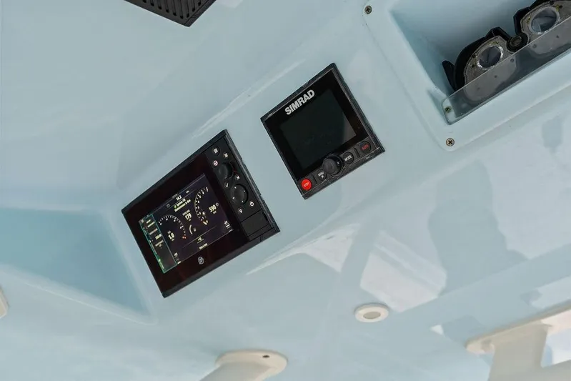  Yacht Photos Pics 2021 Yellowfin 36 Offshore boat dashboard with Simrad navigation system.