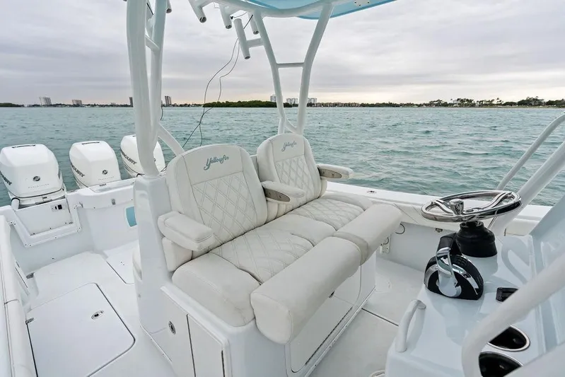  Yacht Photos Pics 2021 Yellowfin 36 Offshore boat interior with plush seating and ocean view.