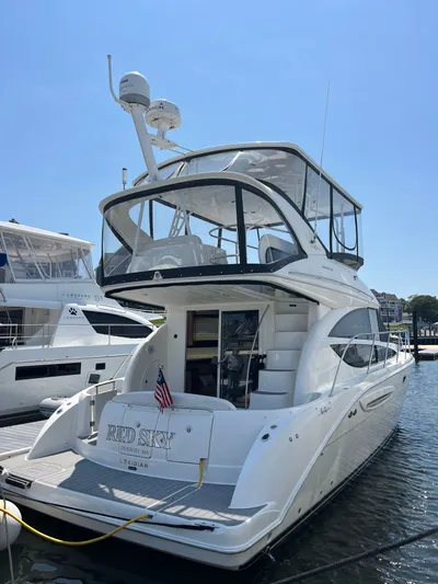  Yacht Photos Pics 2008 Meridian 391 Sedan yacht docked, featuring sleek design and spacious upper deck.