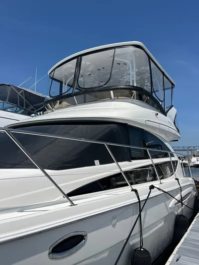  Yacht Photos Pics 2008 Meridian 391 Sedan yacht docked under clear blue sky.