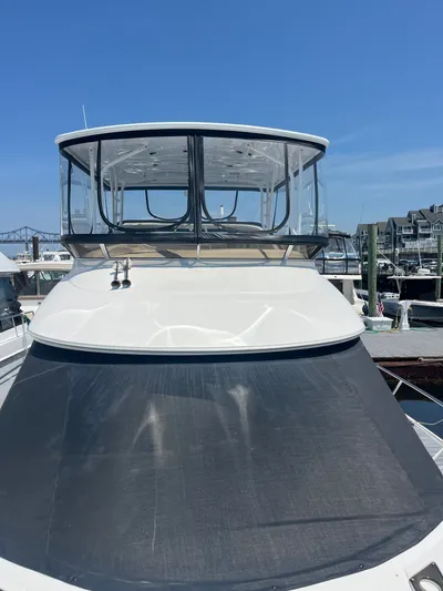  Yacht Photos Pics 2008 Meridian 391 Sedan yacht docked at marina under clear blue sky.
