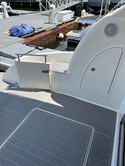  Yacht Photos Pics 2008 Meridian 391 Sedan yacht deck with seating and storage at marina.