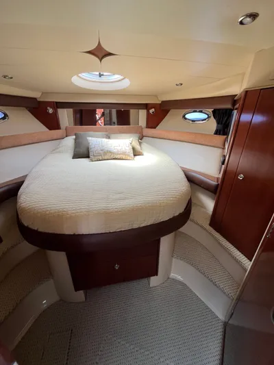  Yacht Photos Pics Luxurious cabin interior of 2008 Meridian 391 Sedan yacht with plush bedding.
