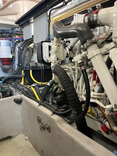  Yacht Photos Pics Engine room of a 2008 Meridian 391 Sedan with visible hoses and components.