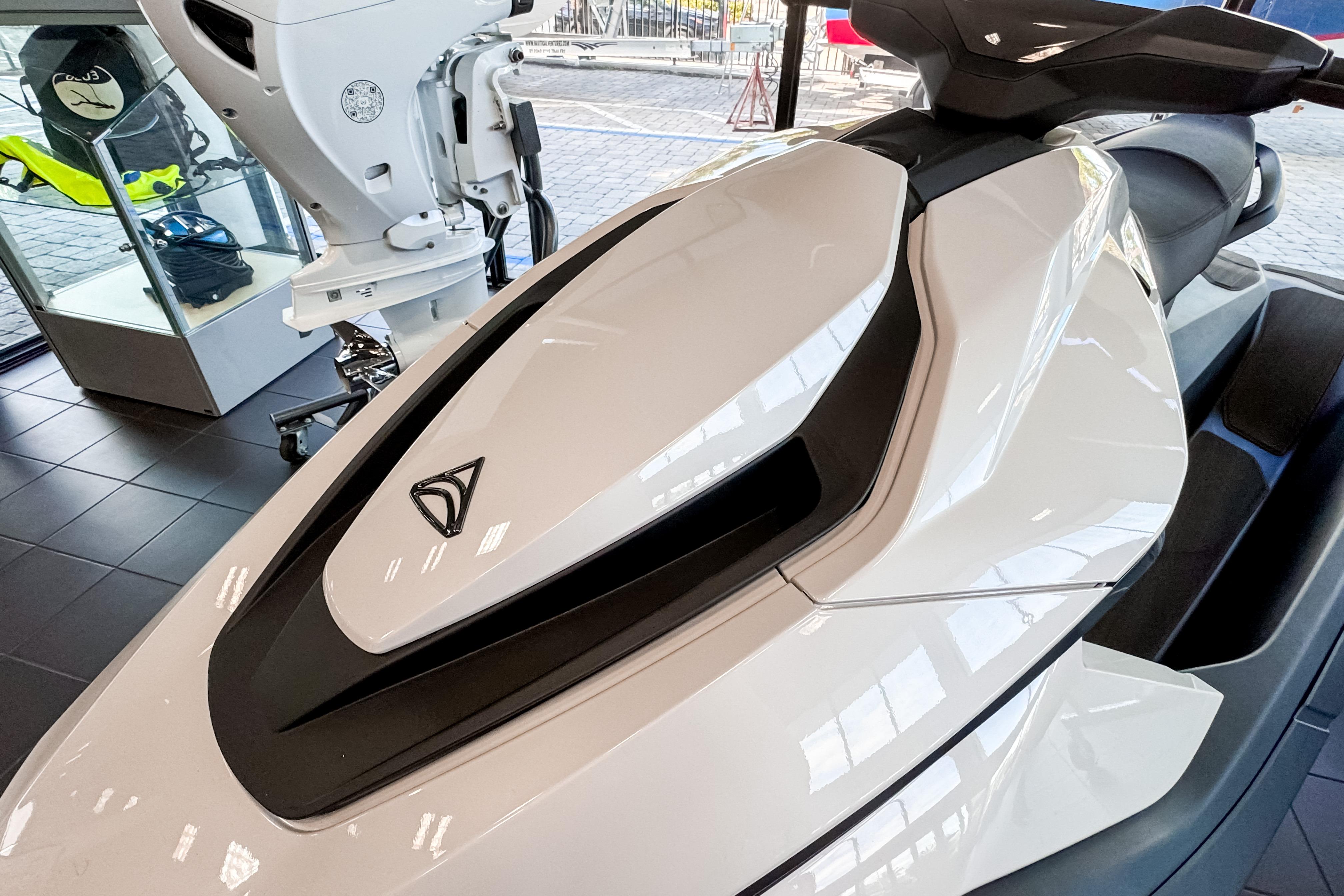2025 Taiga Orca P2 jet ski in showroom, sleek white design.