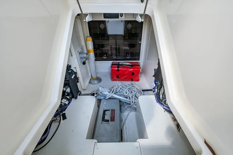 Absent Minded Yacht Photos Pics 2014 SeaVee 430 boat interior with storage, ropes, and equipment.