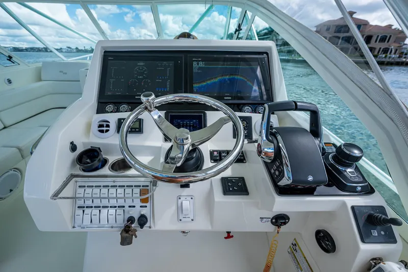 Absent Minded Yacht Photos Pics 2014 SeaVee 430 boat helm with advanced navigation and control systems.