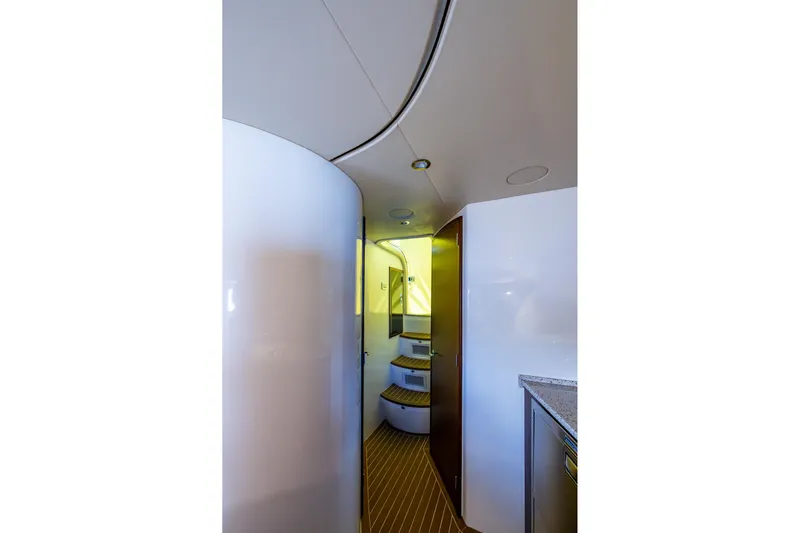 Absent Minded Yacht Photos Pics Interior of 2014 SeaVee 430 yacht with modern design and wood flooring.