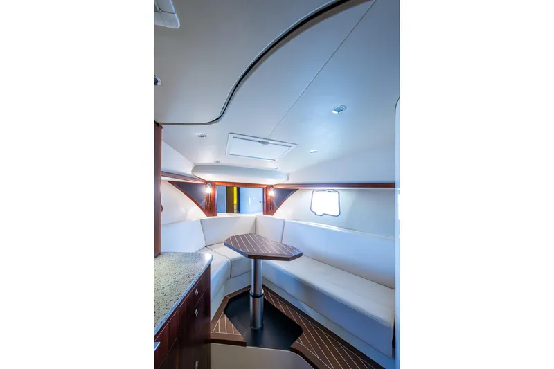 Absent Minded Yacht Photos Pics Luxurious interior of 2014 SeaVee 430 yacht with elegant seating and modern design.