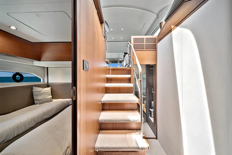 Mine Escape Yacht Photos Pics Interior of 2020 Princess F55 Flybridge yacht with stairs and bedroom.