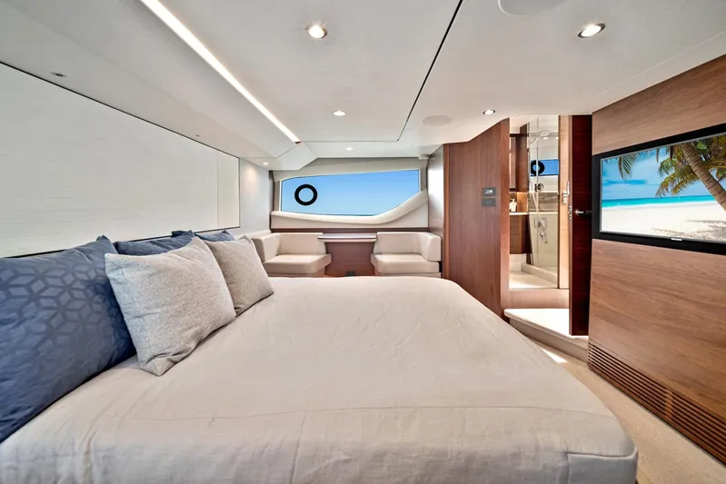 Mine Escape Yacht Photos Pics Luxurious bedroom interior of 2020 Princess F55 Flybridge yacht with ocean view.
