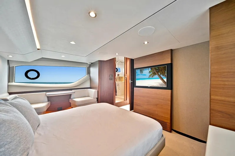 Mine Escape Yacht Photos Pics Luxurious bedroom interior of 2020 Princess F55 Flybridge yacht with ocean view.