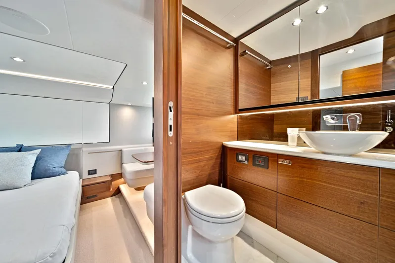 Mine Escape Yacht Photos Pics Luxurious bathroom and bedroom interior of 2020 Princess F55 Flybridge yacht.