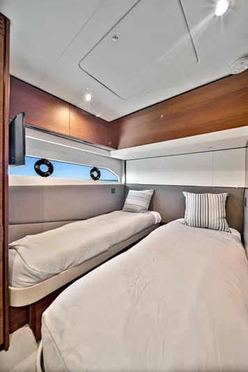 Mine Escape Yacht Photos Pics 2020 Princess F55 Flybridge twin bed cabin with modern interior design.