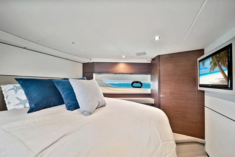 Mine Escape Yacht Photos Pics Luxurious bedroom in 2020 Princess F55 Flybridge yacht with ocean view and TV.