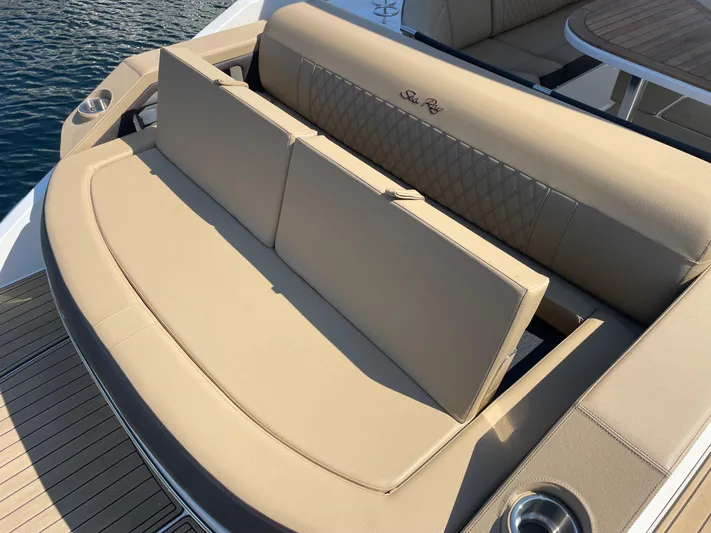  Yacht Photos Pics 2021 Sea Ray SLX 310 boat with beige seating and elegant design.