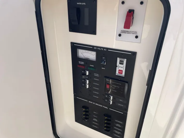  Yacht Photos Pics Electrical panel of 2021 Sea Ray SLX 310 boat, featuring switches and controls.