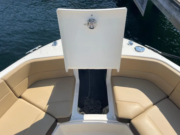  Yacht Photos Pics 2021 Sea Ray SLX 310 boat bow seating with open anchor locker.