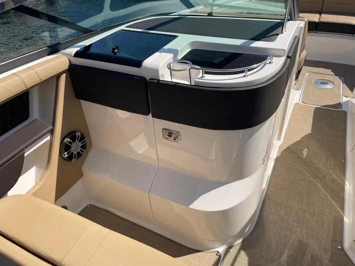  Yacht Photos Pics 2021 Sea Ray SLX 310 boat interior with beige seating and modern design.