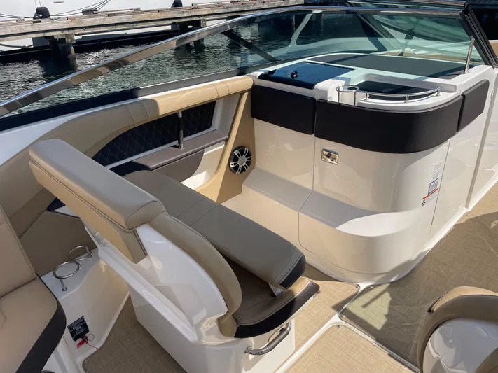  Yacht Photos Pics 2021 Sea Ray SLX 310 boat interior with beige seating and sleek design.
