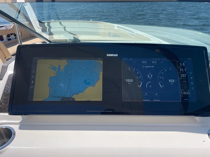  Yacht Photos Pics Dashboard of 2021 Sea Ray SLX 310 with navigation display.