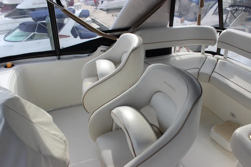 Yacht Photos Pics Interior of 2007 Silverton 36 Convertible yacht with luxurious white seating.
