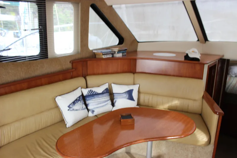  Yacht Photos Pics Interior of 2007 Silverton 36 Convertible yacht with cozy seating and nautical decor.
